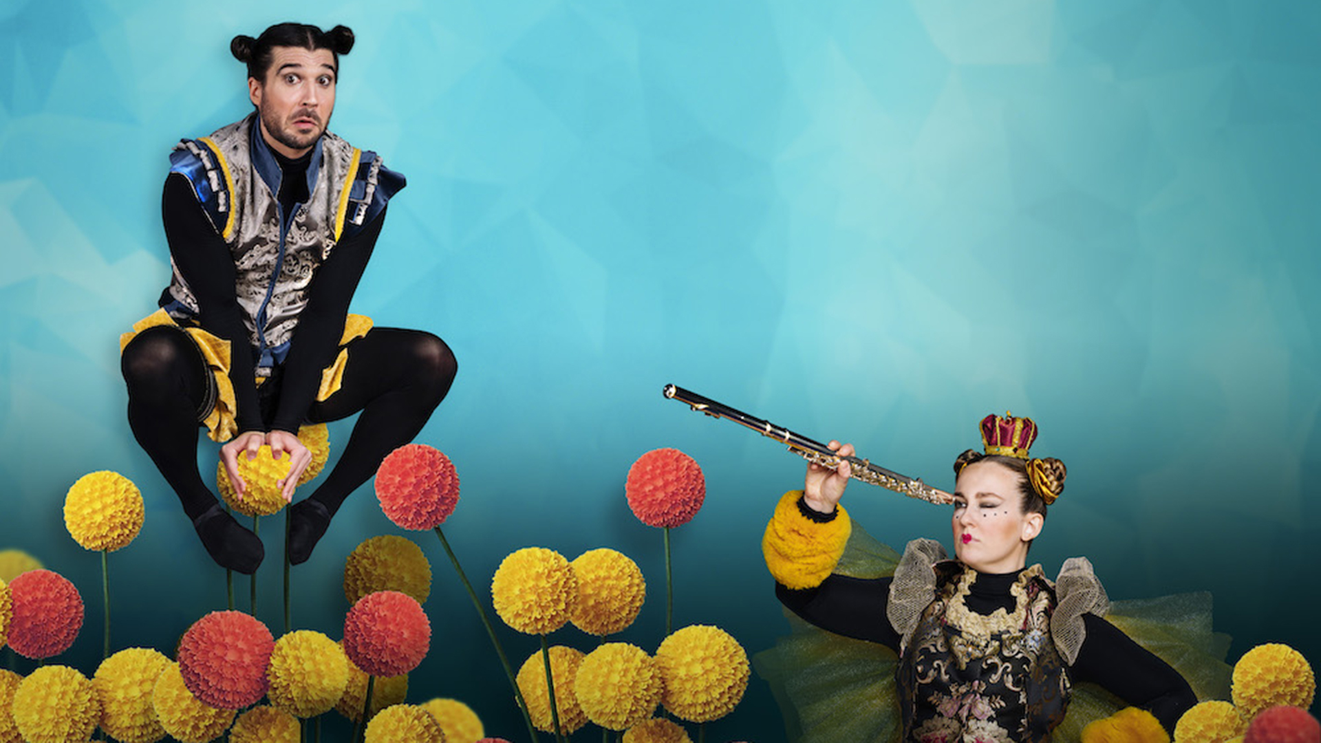 A person jumps into the air in a tucked position, another person is crouched using a flute as a telescope.
